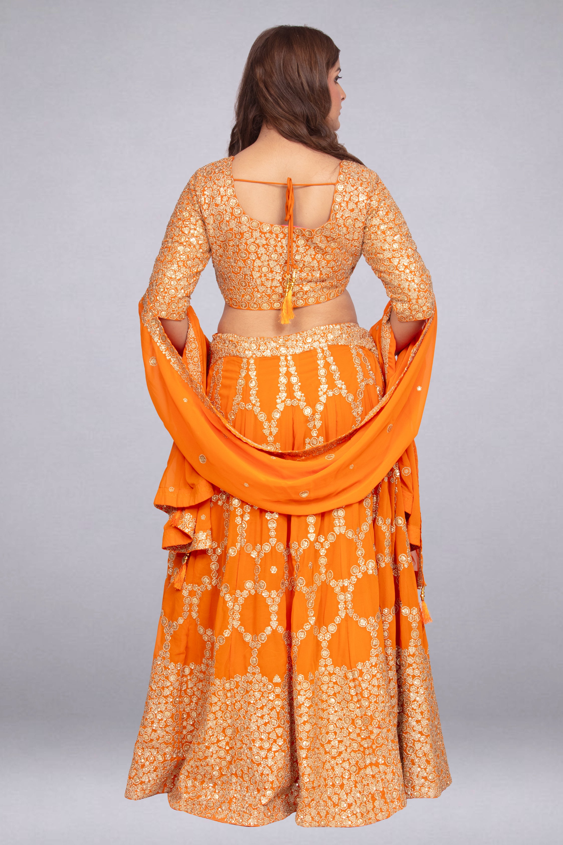 Vibrant Orange Flowing Lehenga Set Secondary image