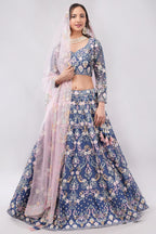 Gorgeous blue color silk lehenga designed with multi color