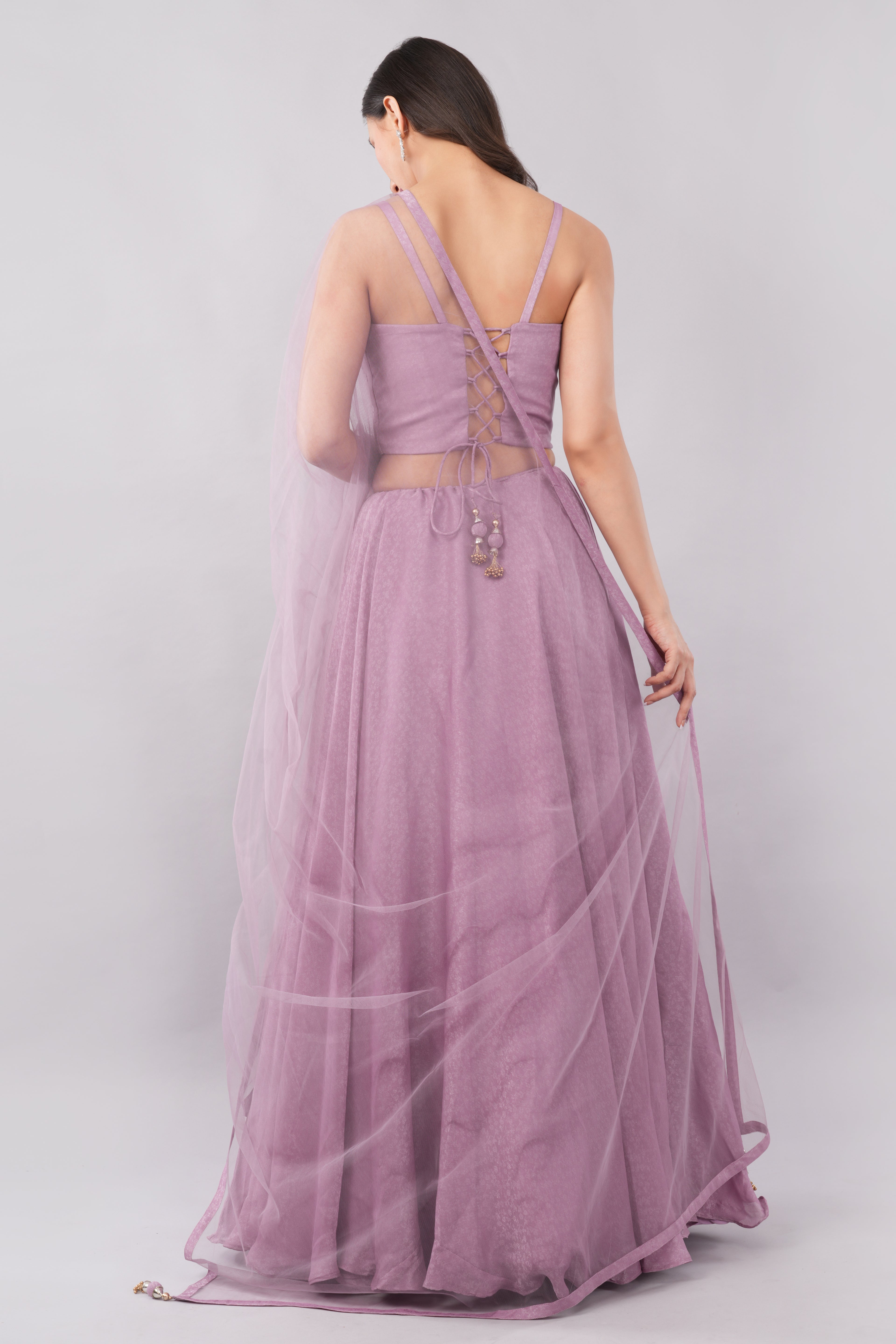 Elegant soft purple tissue lehenga with matching dupatta