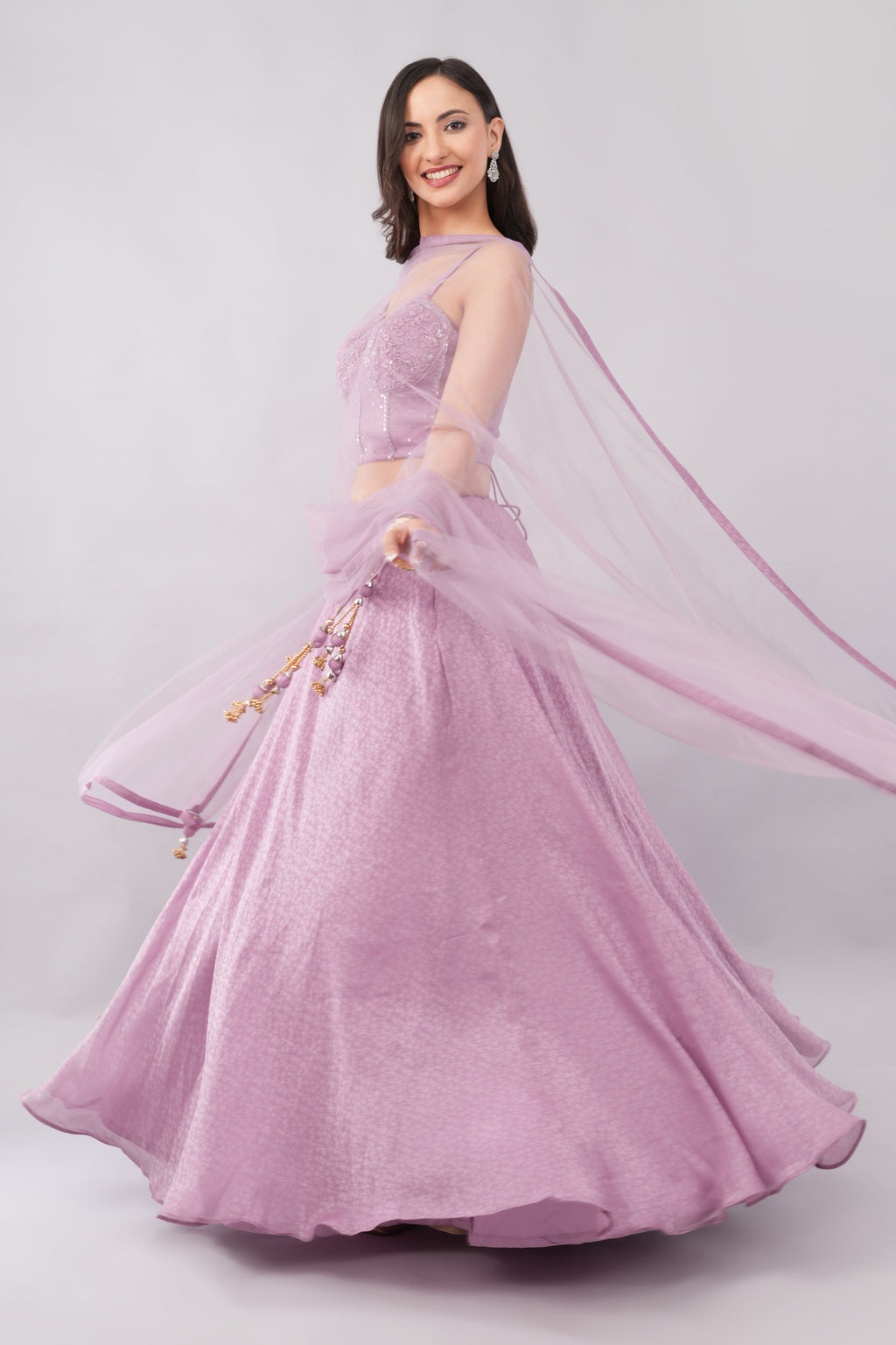 Elegant soft purple tissue lehenga with matching dupatta