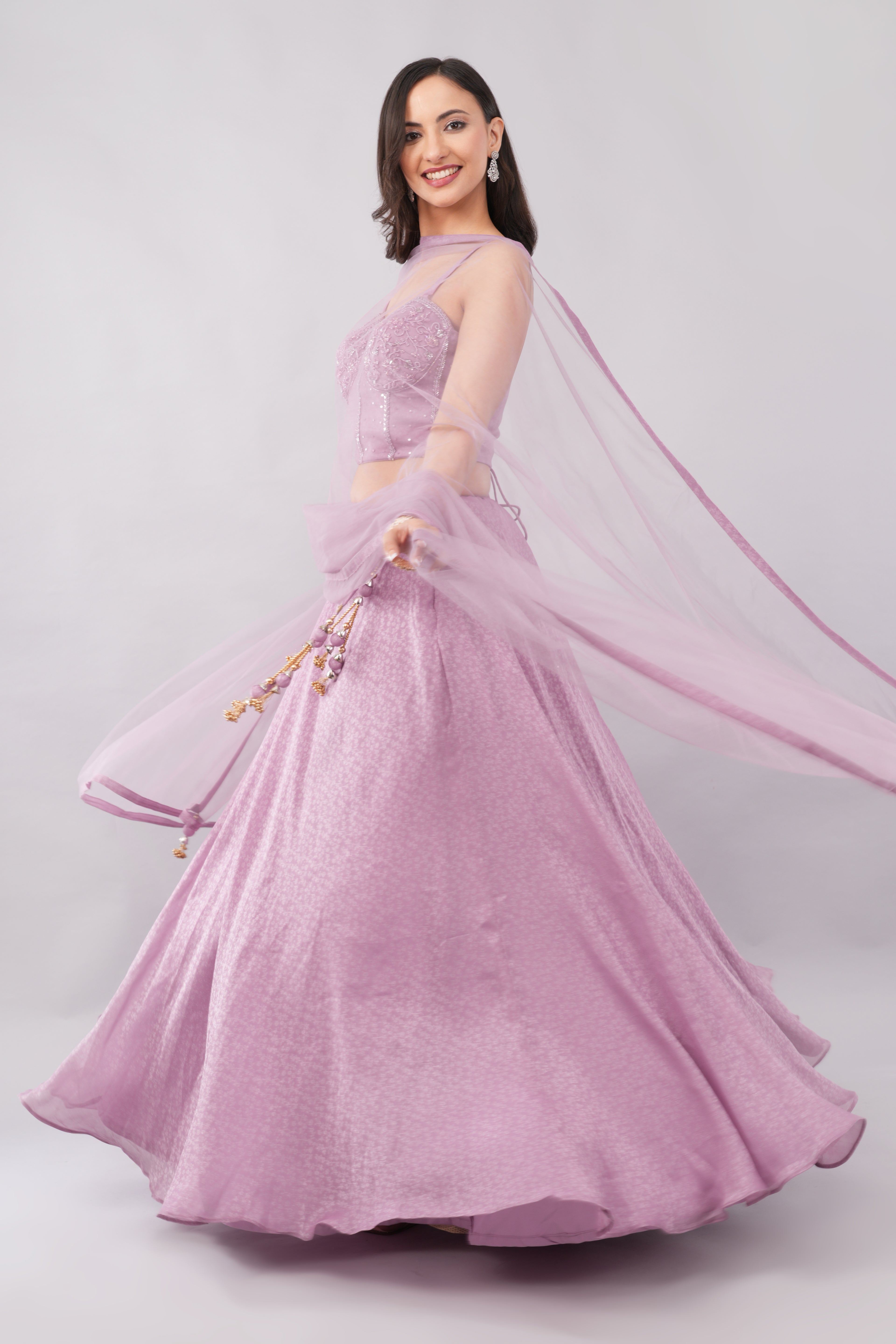 Elegant soft purple tissue lehenga with matching dupatta