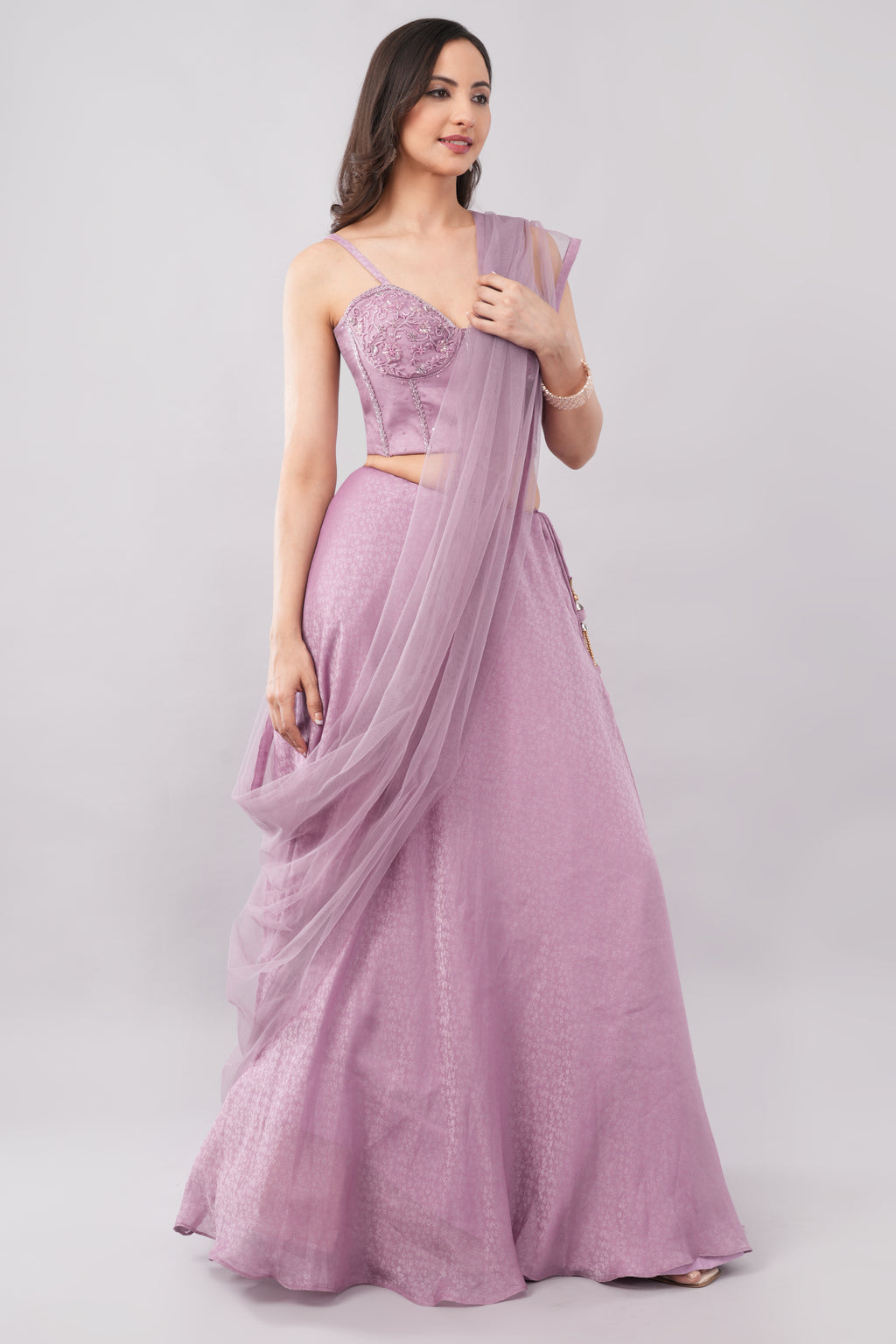 Elegant soft purple tissue lehenga with matching dupatta