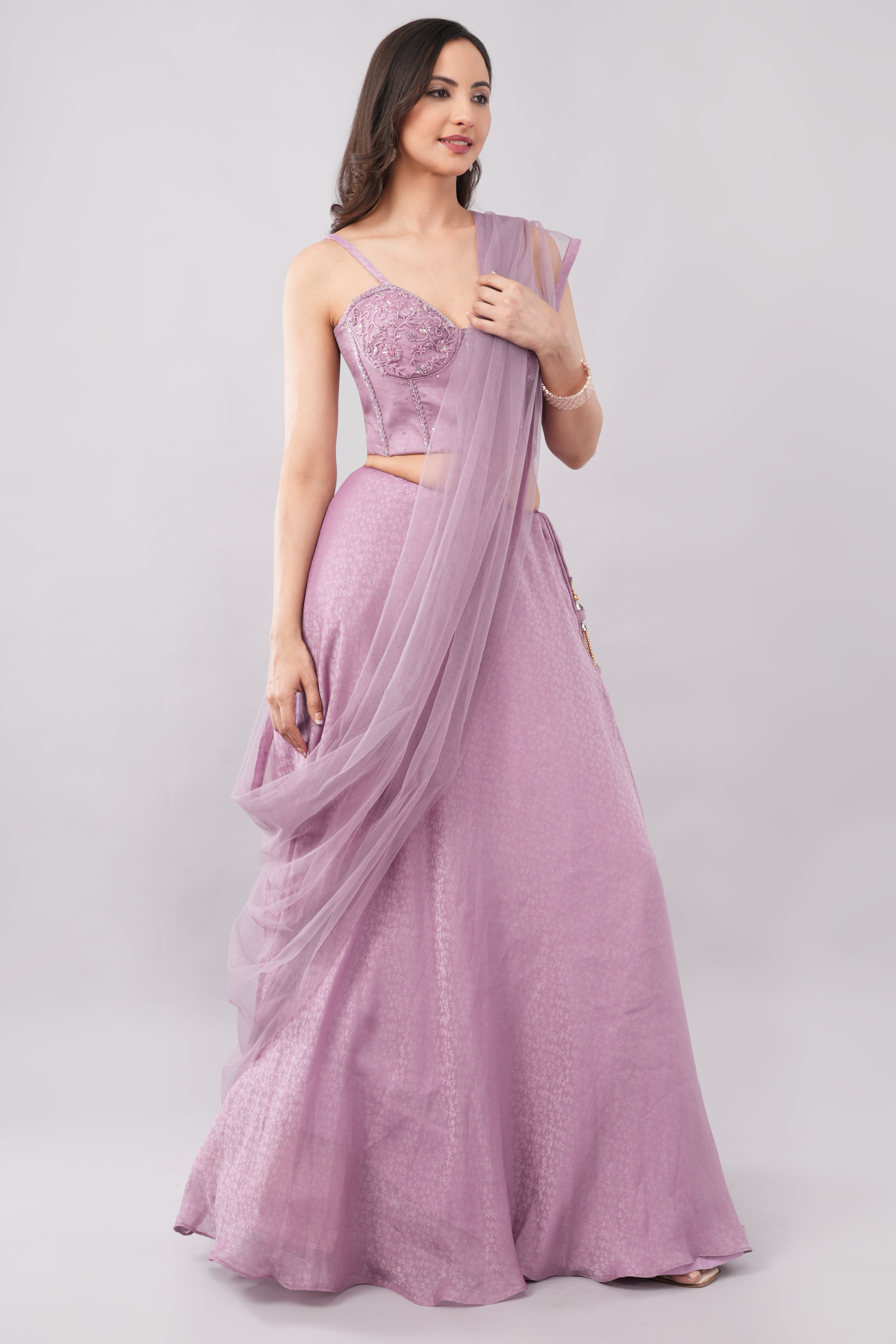 Elegant soft purple tissue lehenga with matching dupatta