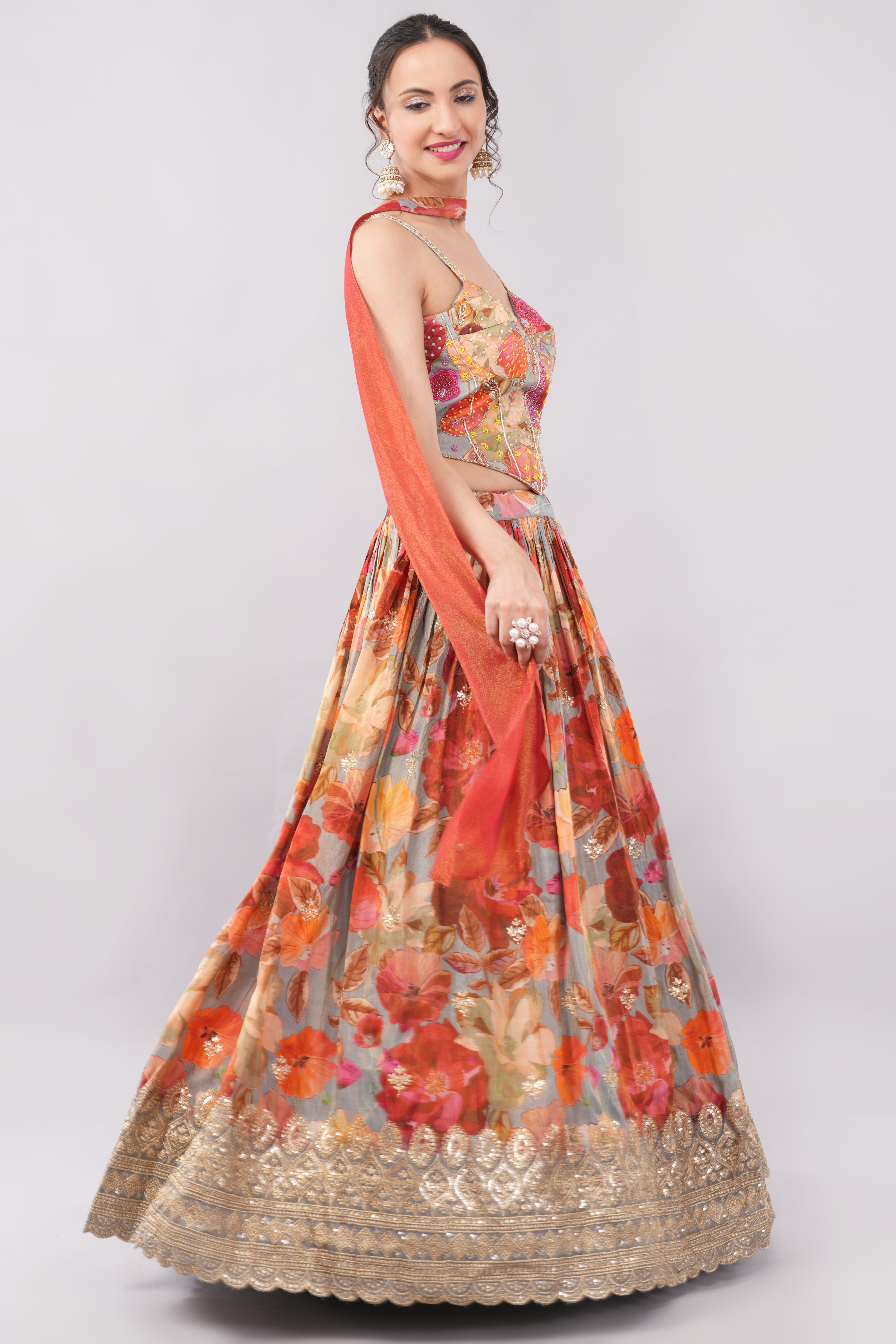 Multi color floral print crafted with choli and dupatta.