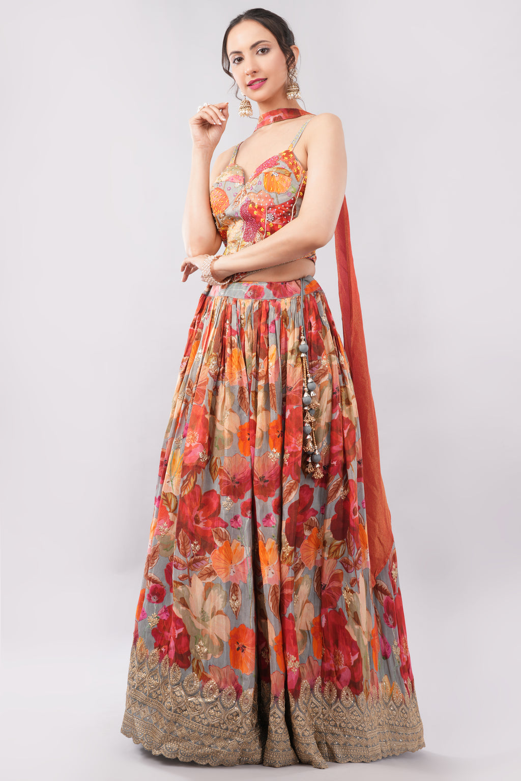 Multi color floral print crafted with choli and dupatta.