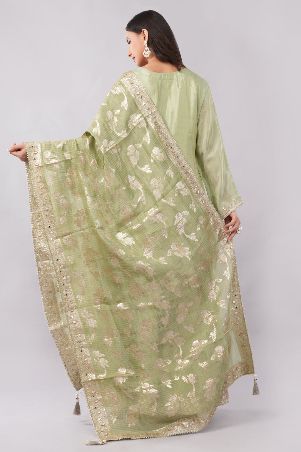 Olive green silk suit with heavy work dupatta