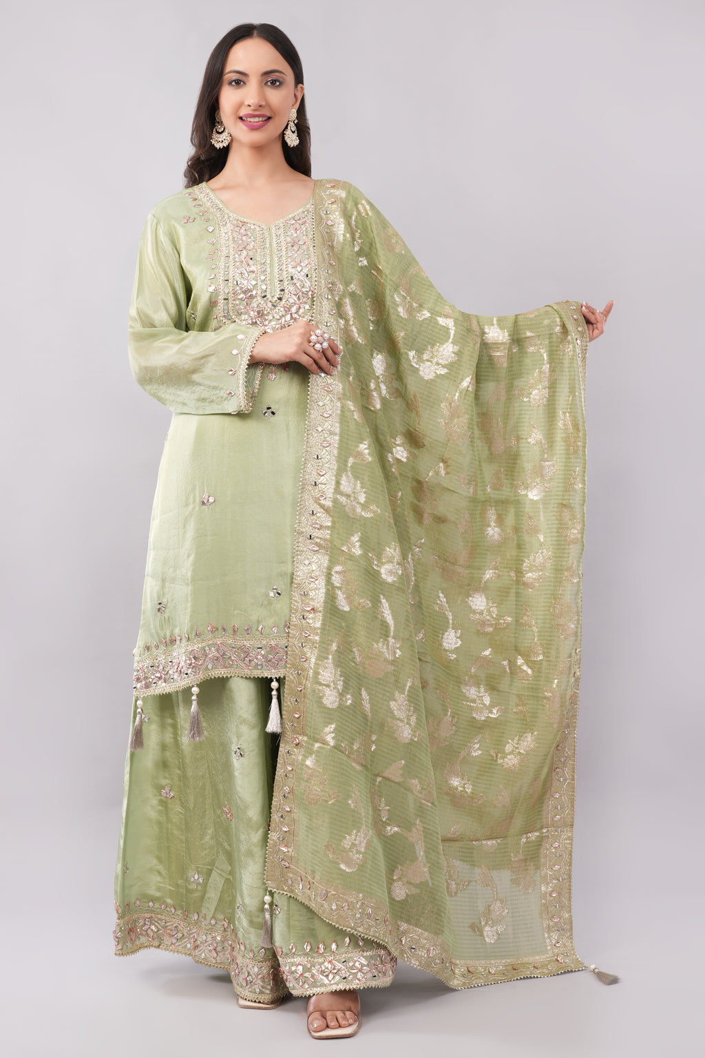 Olive green silk suit with heavy work dupatta