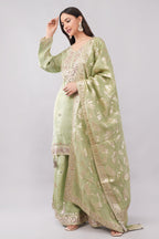 Olive green silk suit with heavy work dupatta