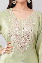 Olive green silk suit with heavy work dupatta