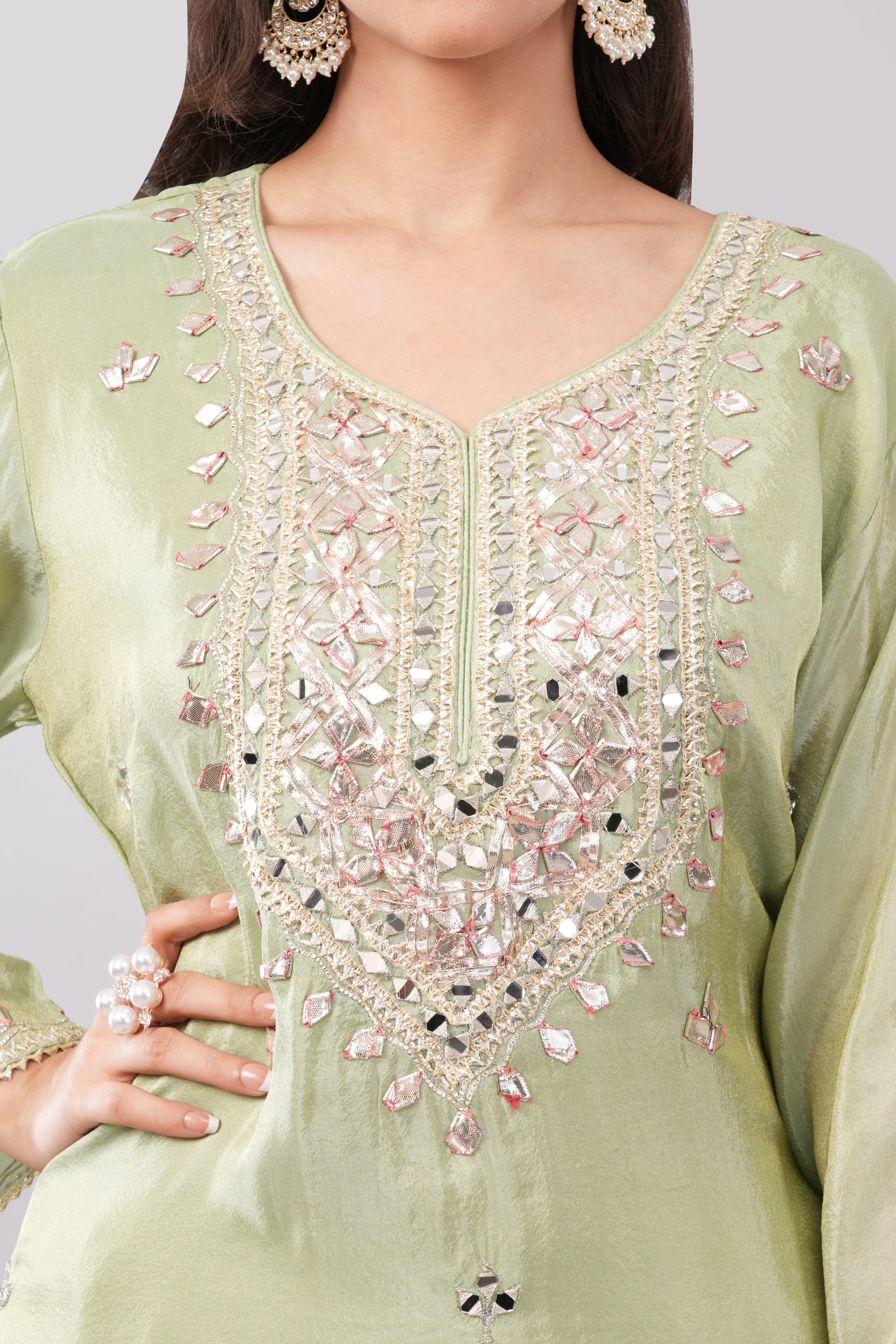 Olive green silk suit with heavy work dupatta