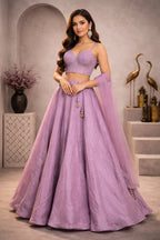 Elegant soft purple tissue lehenga with matching dupatta